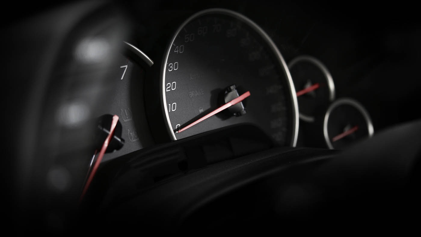 Car Dashboard – Vehicle Instruments. Speedometer in the Dark. Motorsport Theme. Cool Ambient Light. Transportation Photo Collection.
